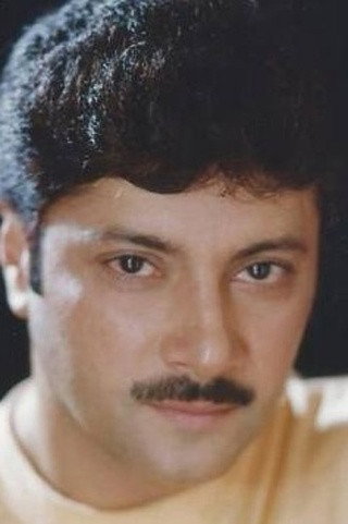 Abhishek Chatterjee as Abhishekh Chatterjee in Alo