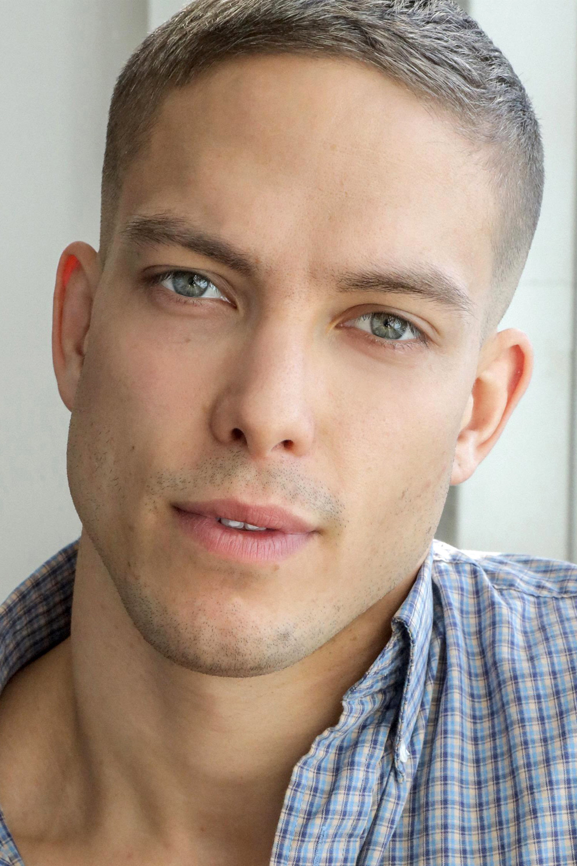 Blake Richardson as 15 in War Machine