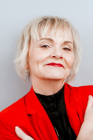 Hana Seidlová as Houbová in Případ pro rybáře