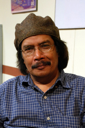 Imuda as Hisham in Imigran