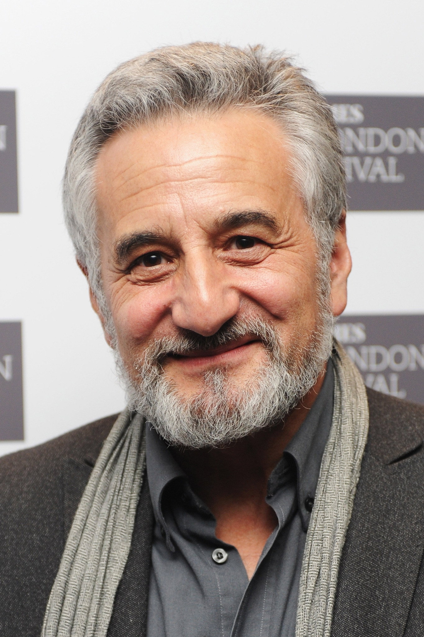 Henry Goodman as Singer in The Regime