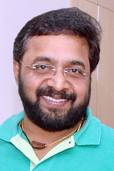 Renji Panicker as Rajmohan Thampi in Childhood Friends