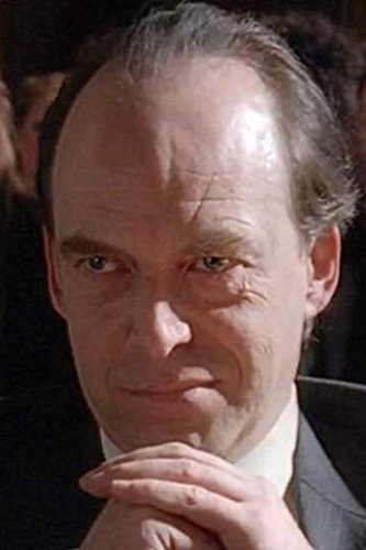 David Petersen as John Collins in Skip Tracer