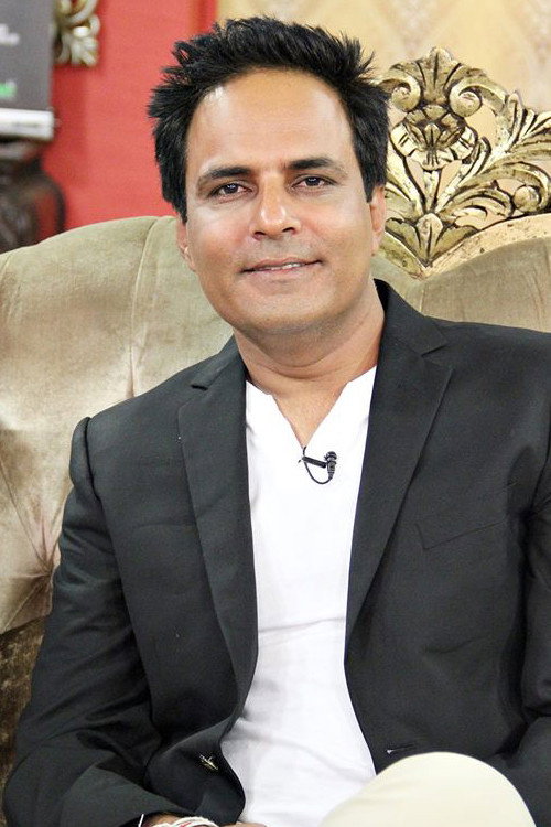 Anjum Shahzad as Naveed "Bobby" in Family Front
