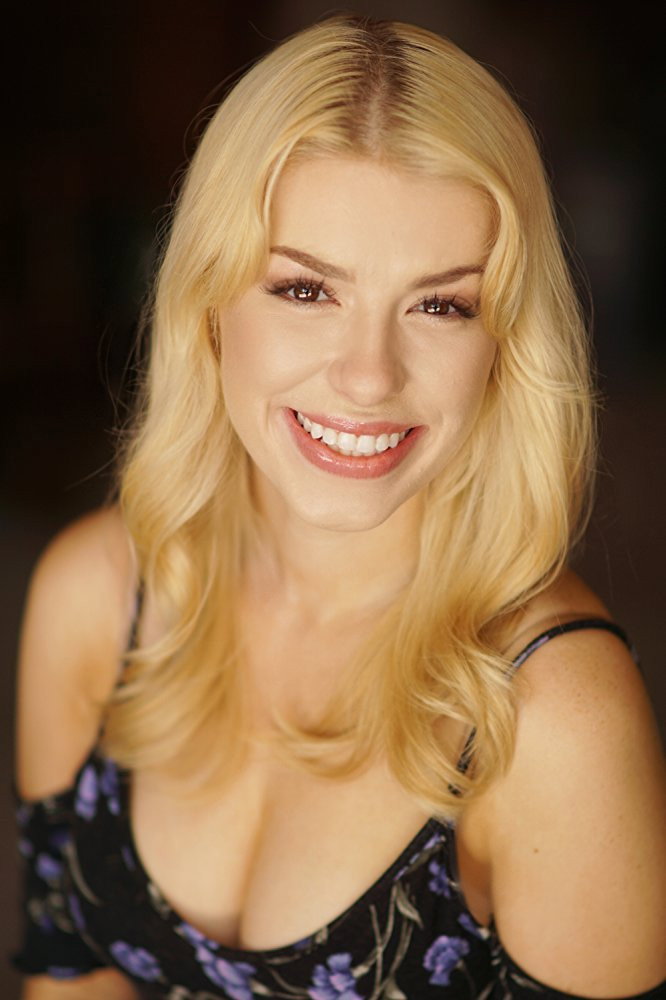 Elizabeth Mears as Janet in Dollface