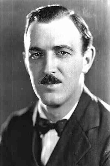 Raymond Griffith as Policeman in A Dash of Courage