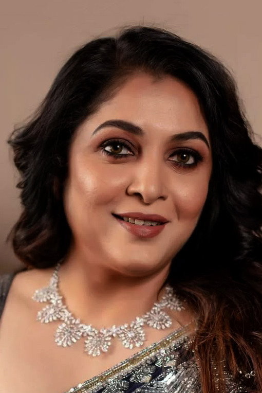 Ramya Krishnan as Azhagu Meena/Jhansi Rani in Thaanaa Serndha Koottam
