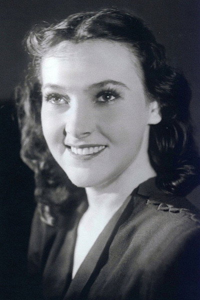 Алла Парфаньяк as Valentina Konstantinovna Petrova (aka Valya), journalist of the newspaper Pionerskaya Pravda and daughter of a major general in The Sky Slow-Mover