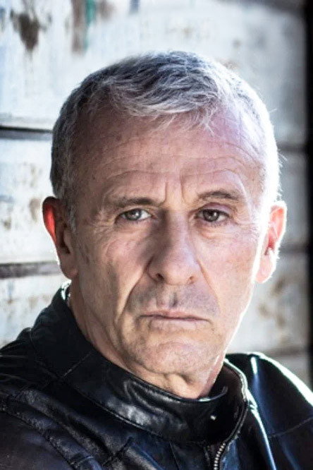 Loris Loddi as Dr. Elliott in Miami Golem