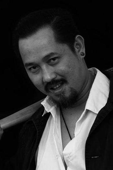 Arrian Labios as Tatay in Kneeling on Mung Beans