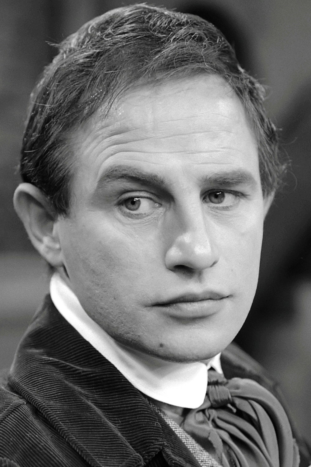 Julien Schoenaerts as Detief / boatman in It Will Never Be Spring