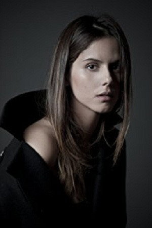 Caroline Ivari as Emma Harper in Alien Convergence