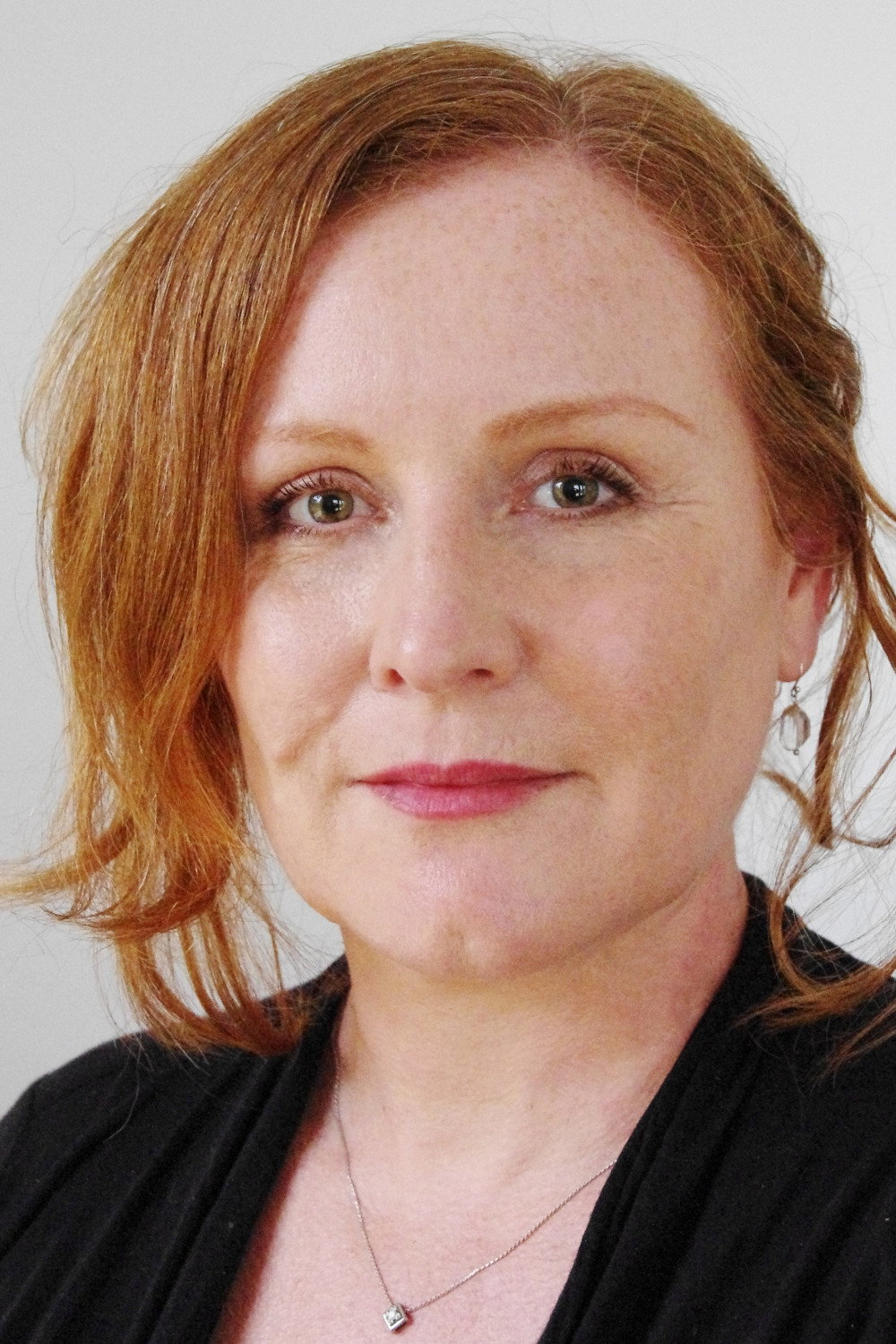 Eliza Logan as Front Office Lady in Miracle Fish