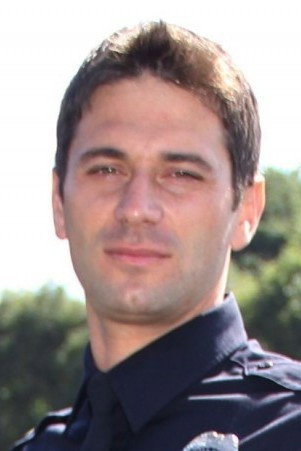 Ciprian Clipea as Police Officer in Iceberg