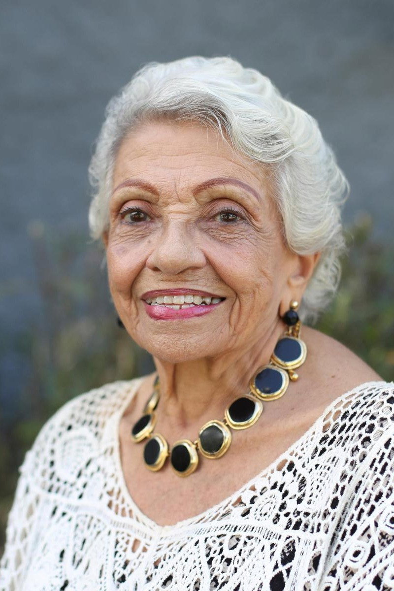 Luz María Rondón as Correcaminos in Barrios