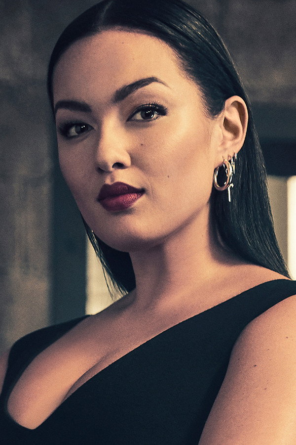 Mia Kang as Amy Tan in Spinning Out of Control