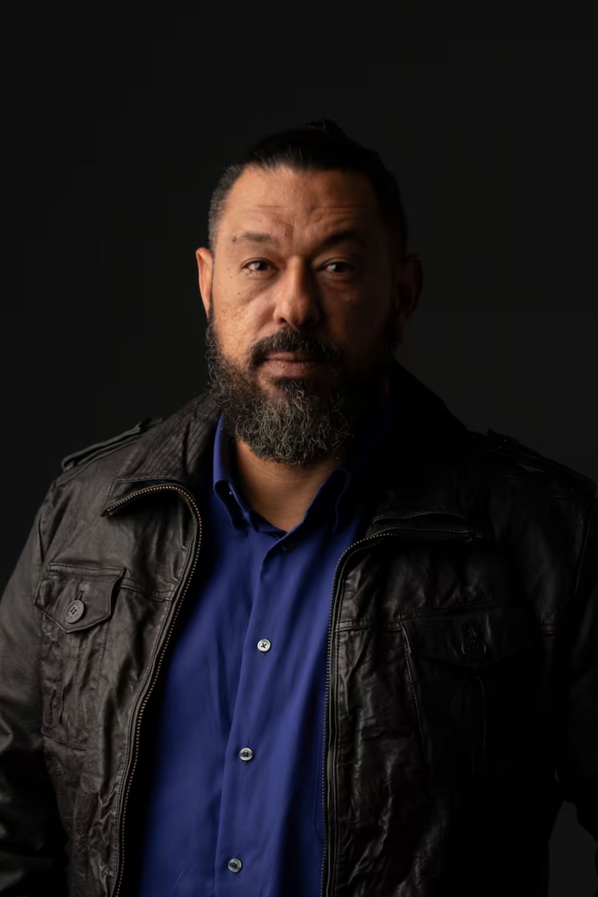 Jaime Newball as Padrino in Escribiendo El General