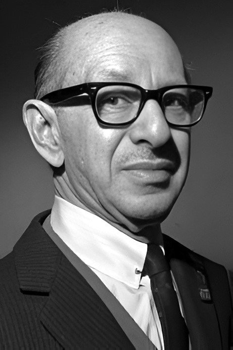 Louis Sobol as Radio executive in The Radio Murder Mystery