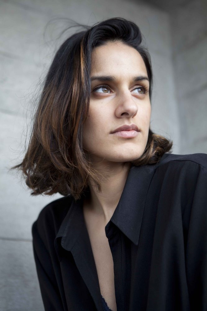 Hussina Raja as Aminah in The Long Goodbye