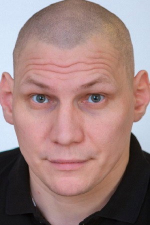 Константин Игнатьев as Demidov's security guard in Courier from 'Paradise'