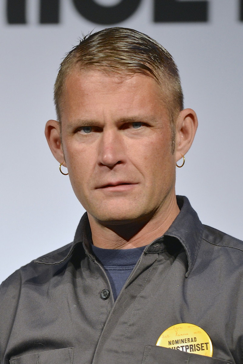 Carl-Michael Edenborg as Tattooed man in Something Must Break