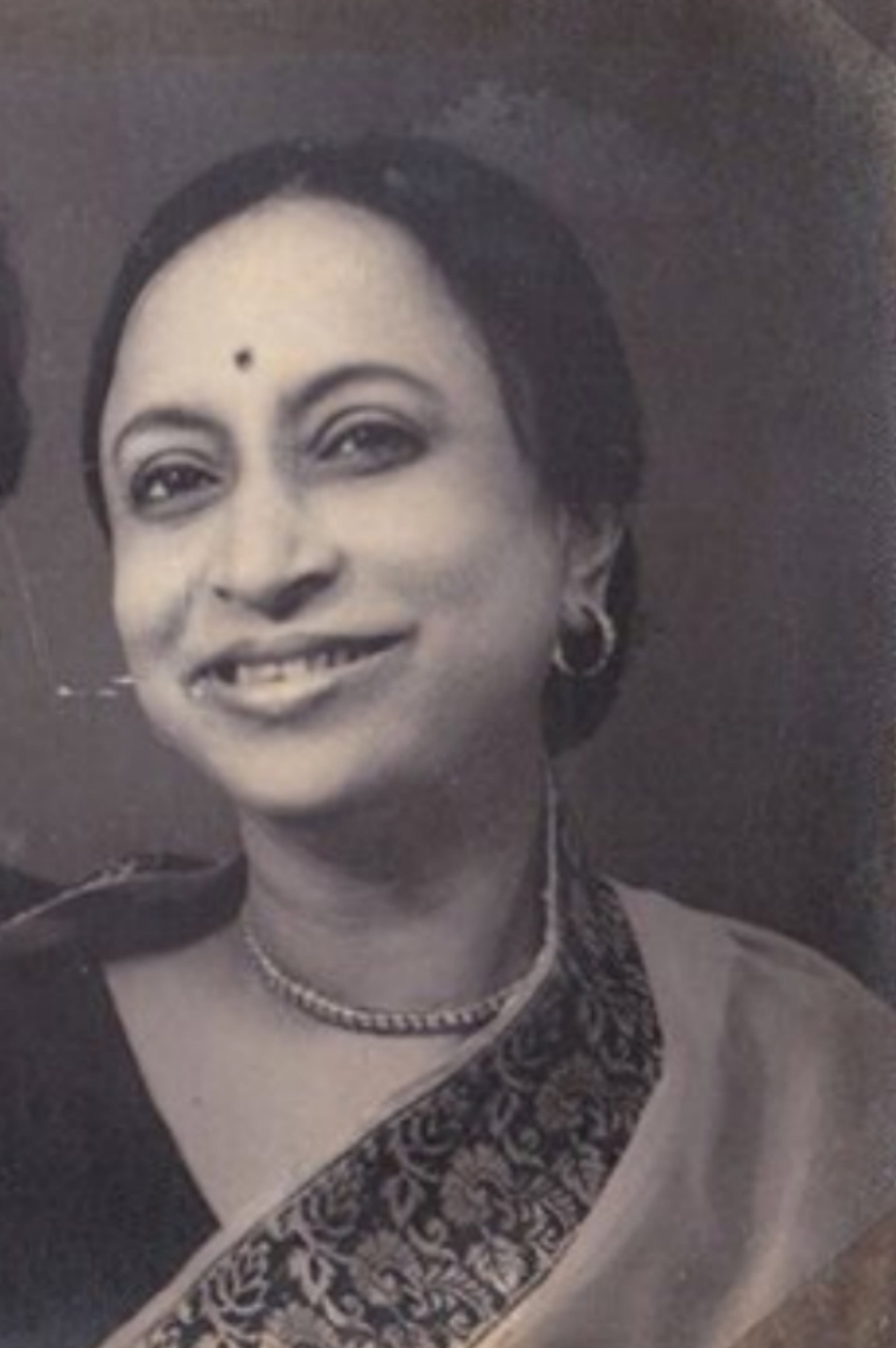 Rawshan Zamil as Midwife in Srabon Megher Din