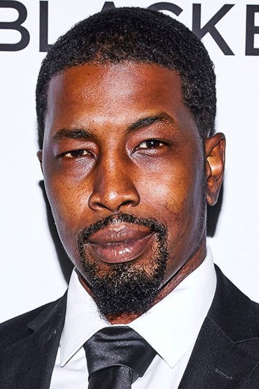 Isiah Maxwell as District Attorney Hopkins in Dirty Cops