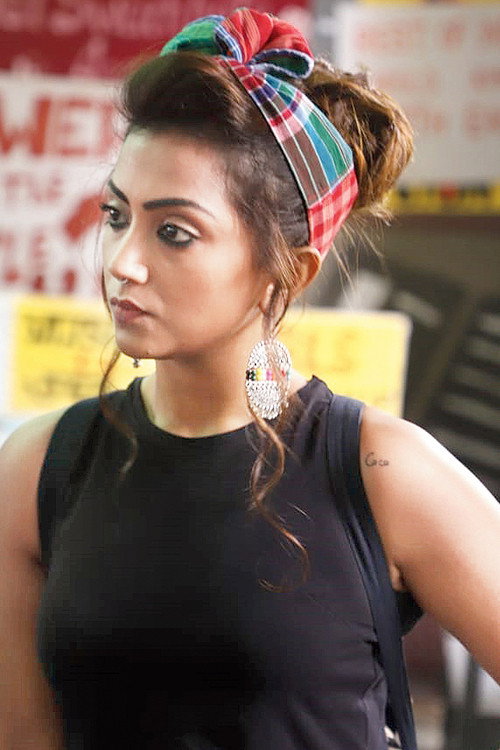 Anindita Bose as Sheela Bose in Murder in the Hills