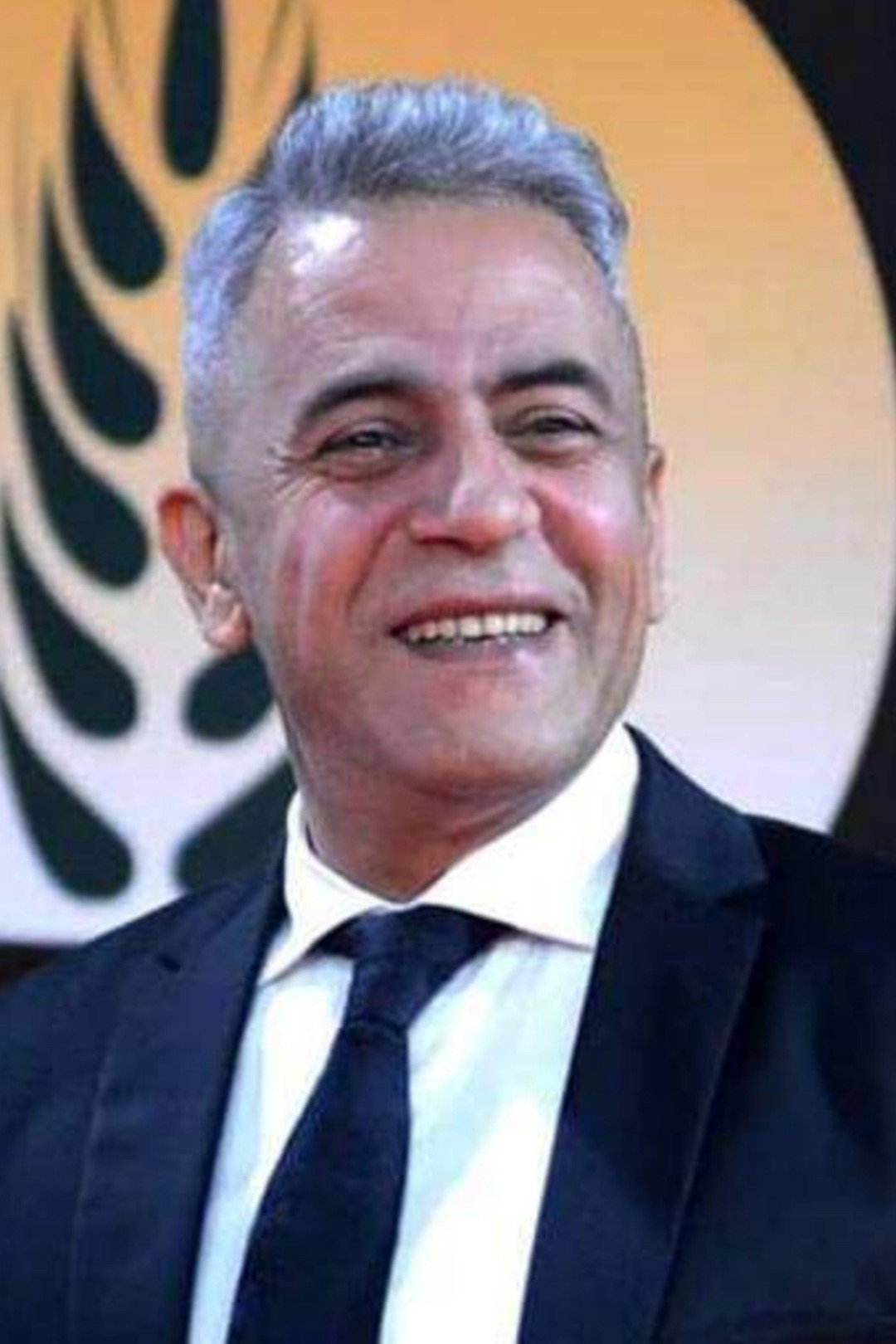 Sabry Fawaz as حسن in We Beinana Mia'd