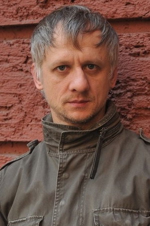 Ivan Barnev as Slavi in Footsteps in the Sand