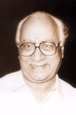 Poornam Viswanathan as Yamuna's Father in Aasai