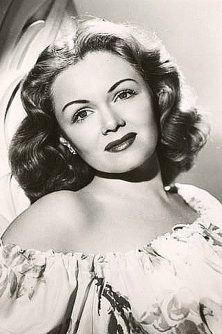 Geneva Gray as June Forbes in Gun Talk