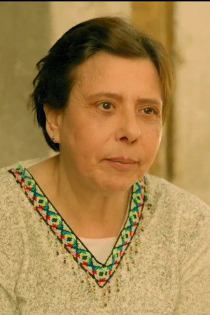 Sawsan Abou Affar as Um Saad in Children of Adam