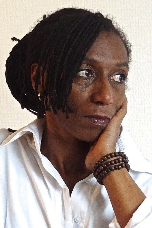 Mylène Wagram as Clarisse in French Wedding, Caribbean Style
