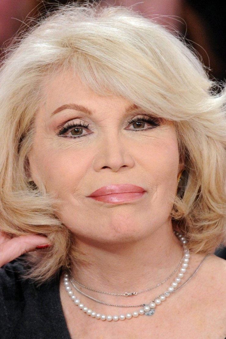 Amanda Lear as Self - Host in Peep!