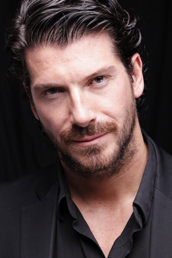 Jack Queralt as Phil in Fuga Orientale