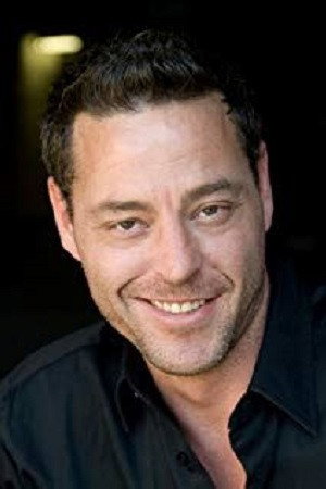 Dean Aylesworth as Cop #1 in Double Cross