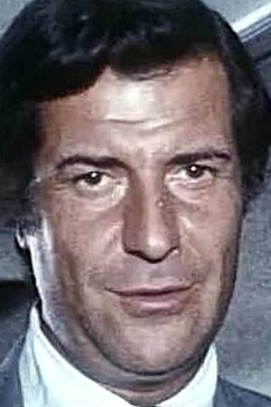 Henri-Jacques Huet as Mr. Joly in Slogan