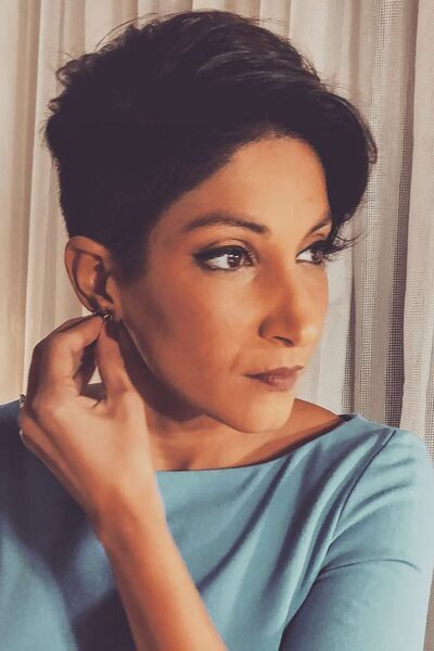 Maya Sarao as Shalini Guha in A Thursday