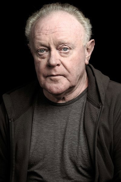 Robert Blythe as Grocer in An Ordinary Man