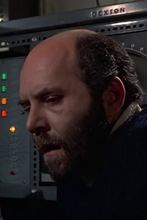 Milos Kirek as Krashneff's Interpreter in Sex Play