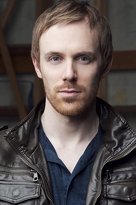 Kyle Rideout as Ed Brinson in Secrets in the Attic