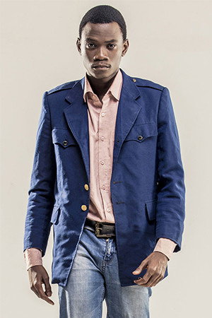 Ange Eric N'guessan as Koffi Boni Jr. in Jazz Infernal
