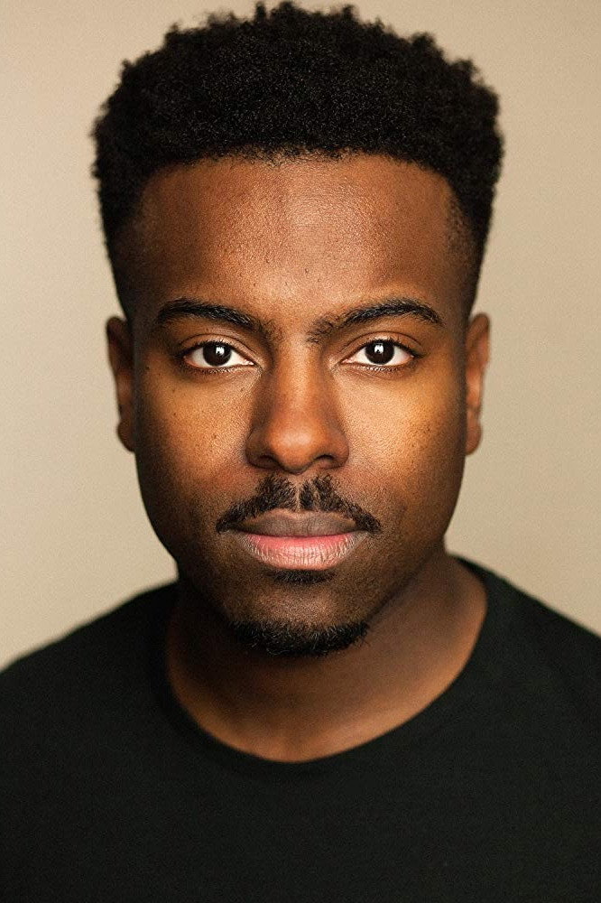 Akemnji Ndifornyen as Michael in The Ballad of Wallis Island