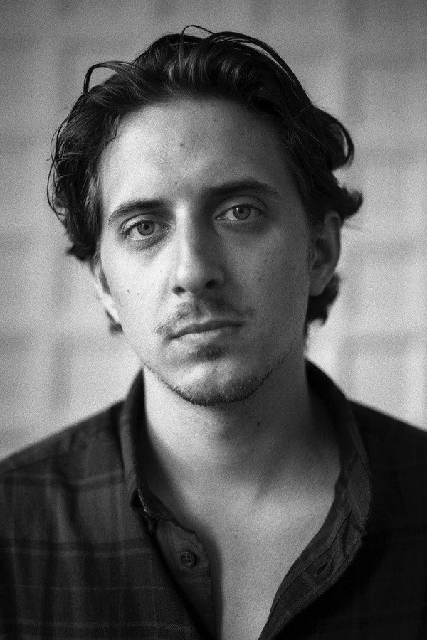 Mariusz Bąkowski as Adam in Interior
