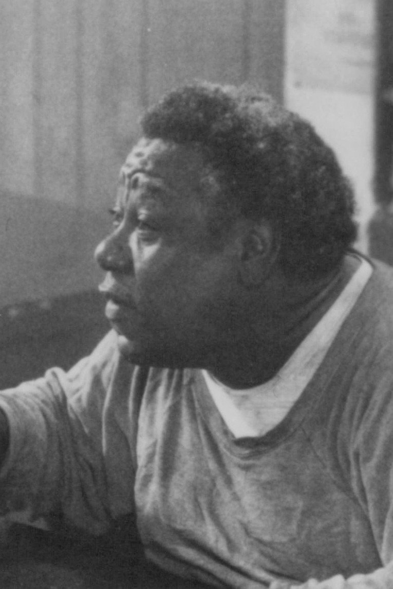 Chino 'Fats' Williams as Owner of Bertha's Cafe in Secret Agent 00 Soul