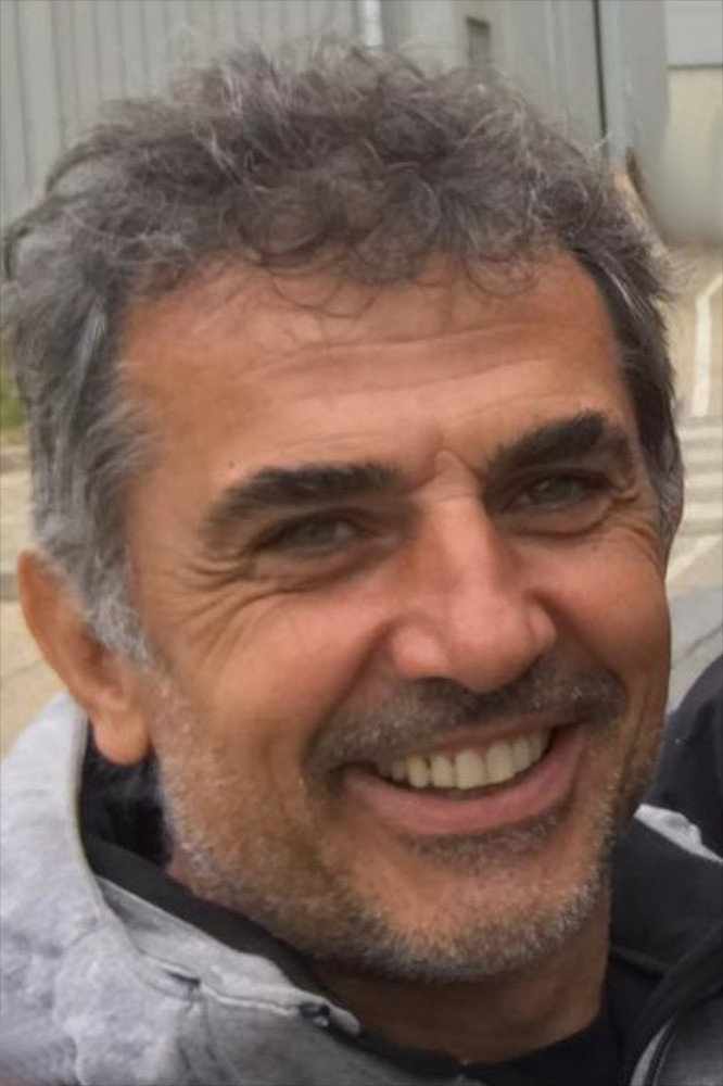 Kaloian Vodenicharov as Man in Black in Sharks in Venice