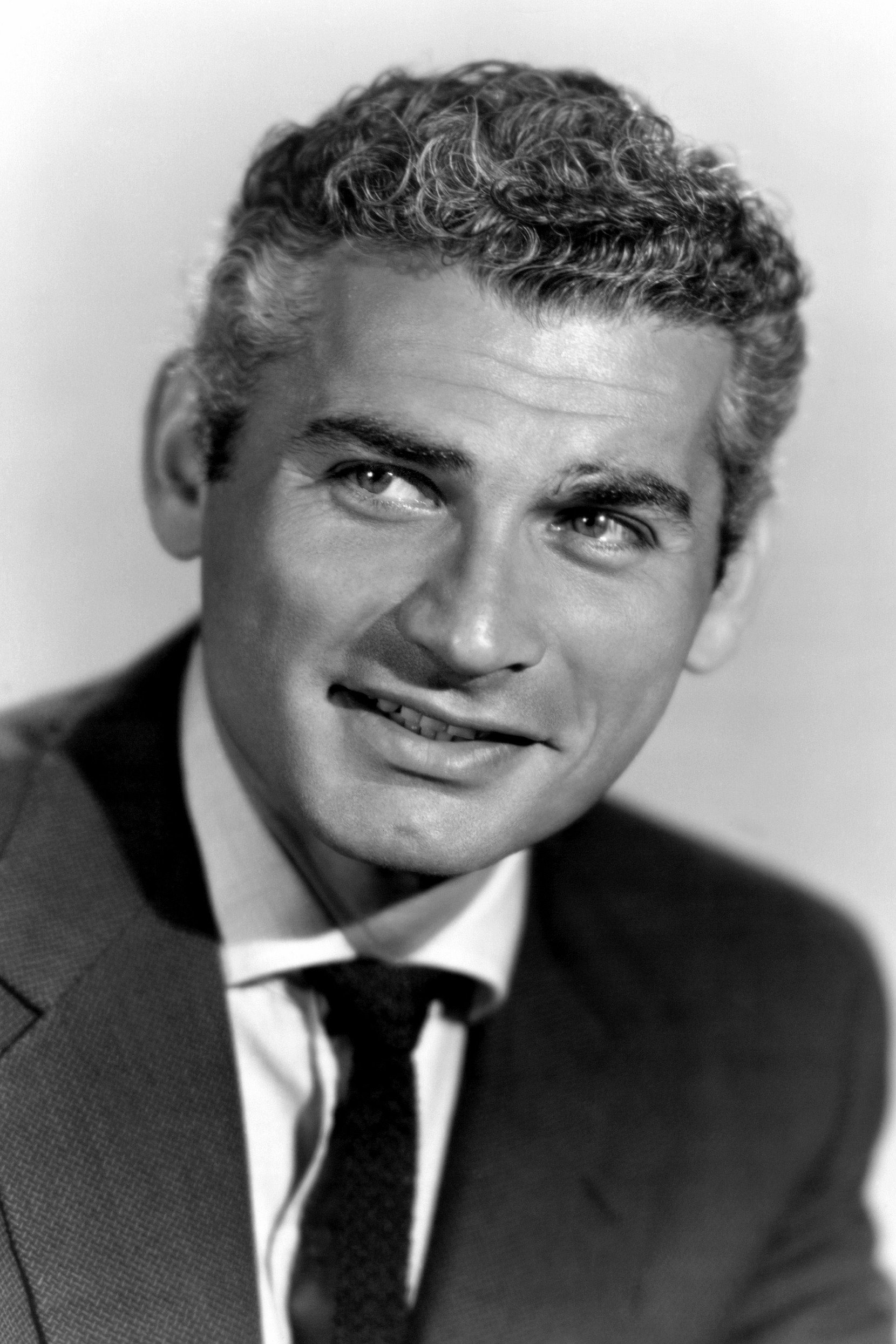 Jeff Chandler as James Gordon Blane in The Tattered Dress