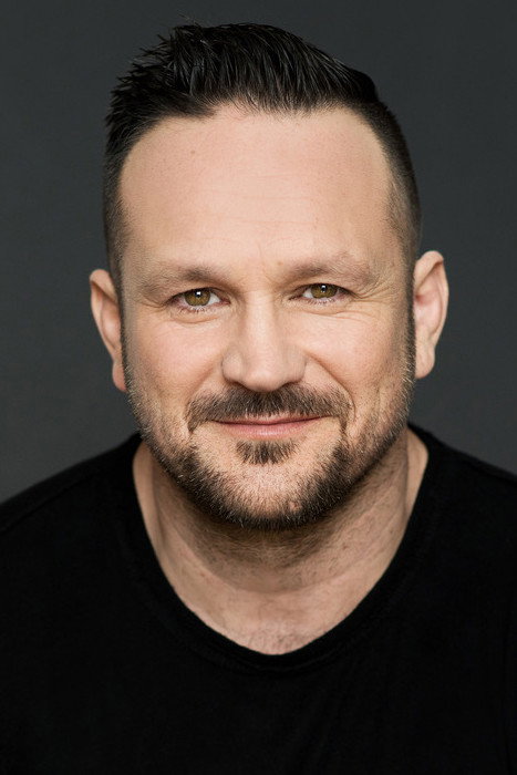 Louis-Philippe Dandenault as Normand Tremblay in Tribu.com