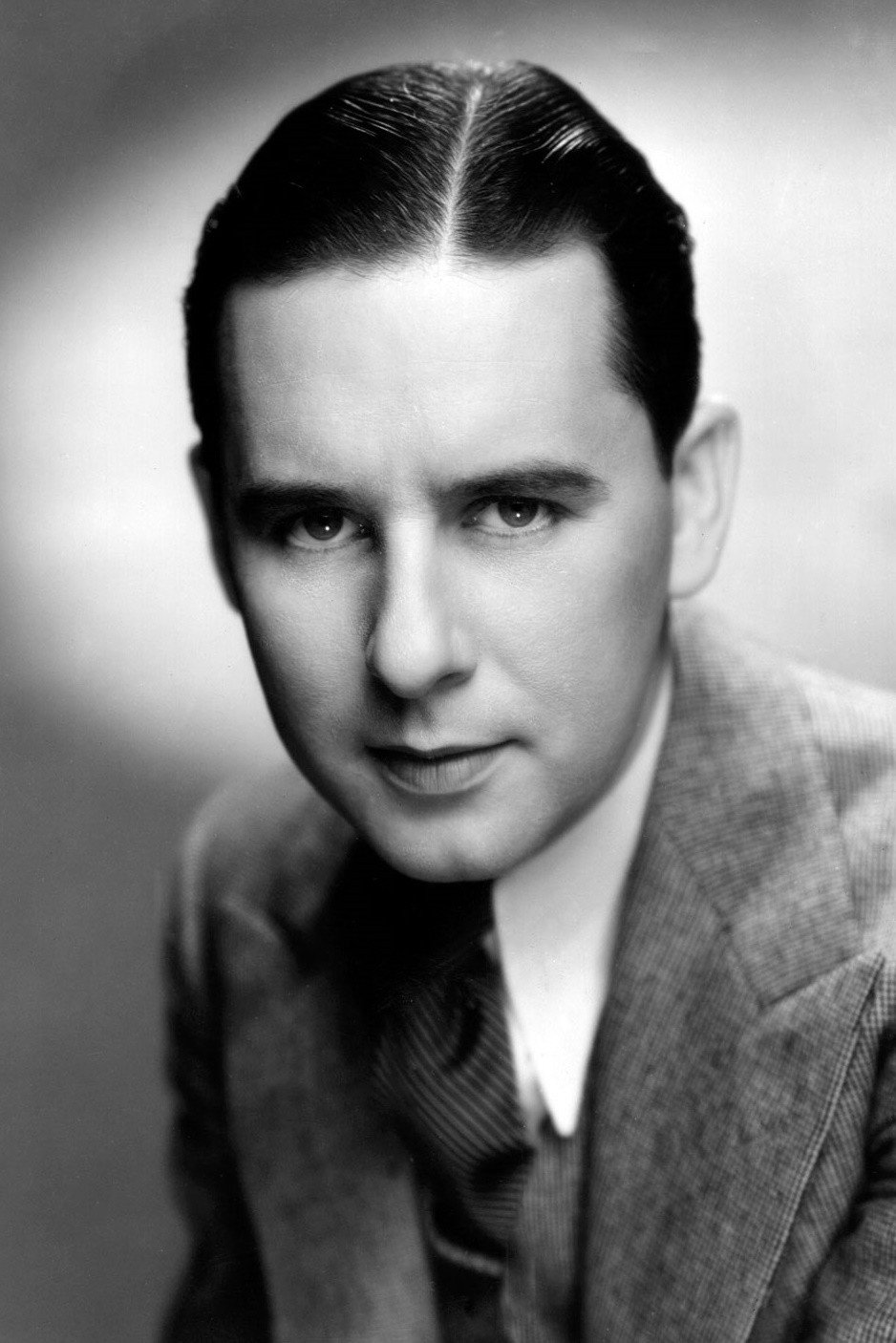 Ben Lyon as H. Joseph 'Joe' Miller in I Cover the Waterfront